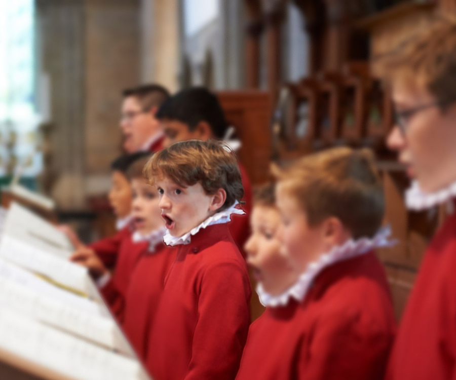 choristers singing in a cathedral